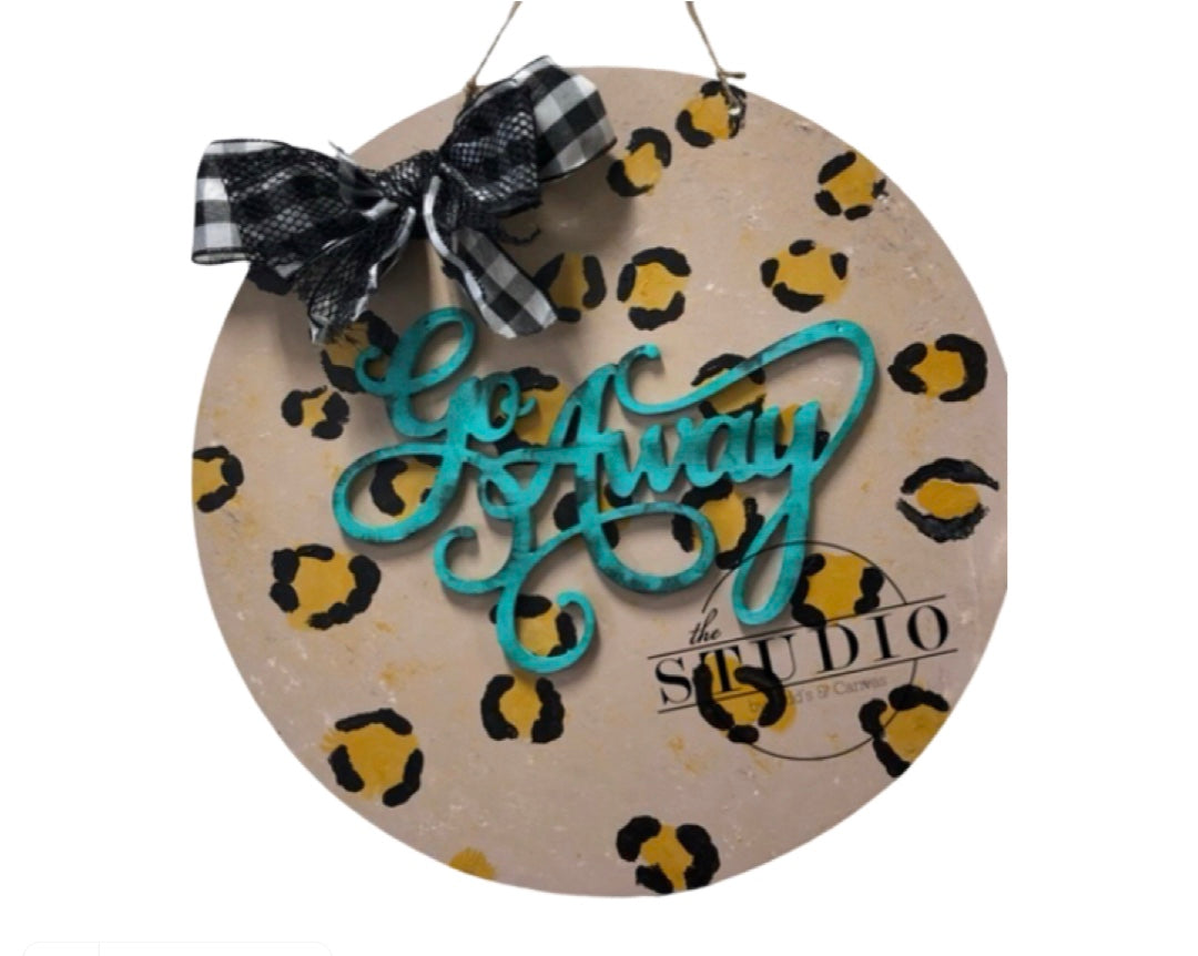 Go away leopard- round door hanger